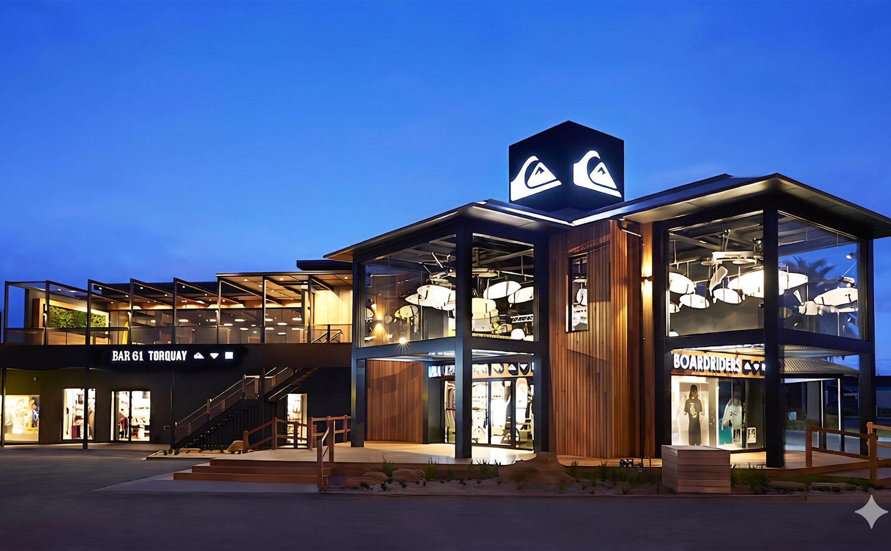 The bold exterior of Boardriders Torquay combines timber cladding and glass façades, offering glimpses of its surf-inspired interiors. The illuminated logo and Bar 61 deck highlight the store’s dual role as a flagship retail destination and community hub.