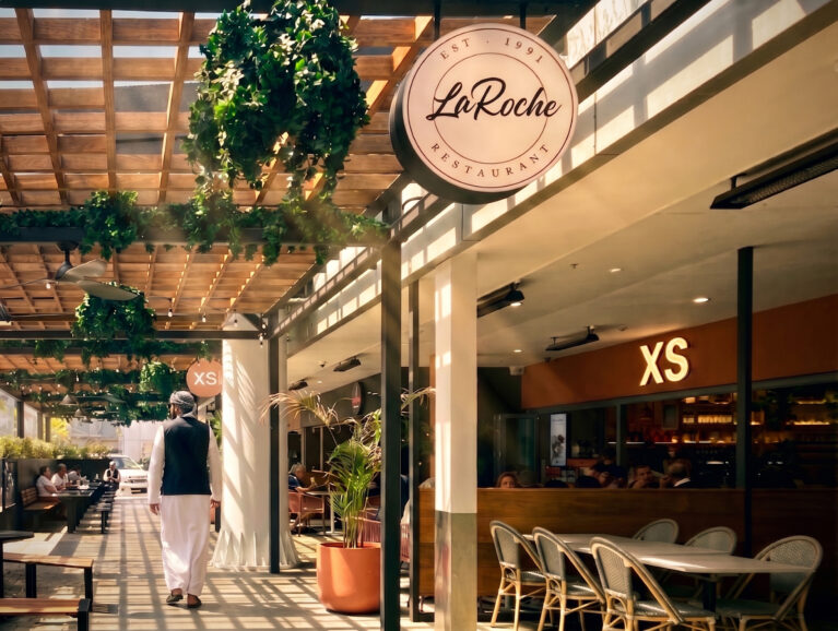 Timber pergola, glass roofing, dappled light, external dining, F&B precinct, black columns, stone paving, bench seating, string lights, hanging baskets, external signage, precinct landscaping, Sydney retail, community amenities.