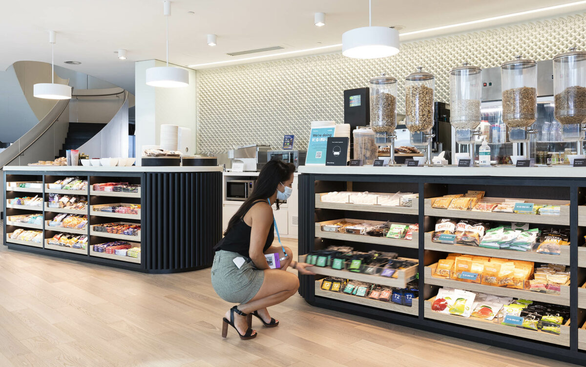 A seamless self-serve kitchen space featuring clean lines, subtle curves and user-friendly storage, designed to support daily rituals from quick snacks to casual conversations.