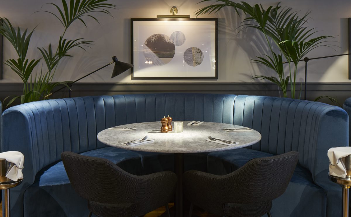 Plush Banquette and Marble Nook