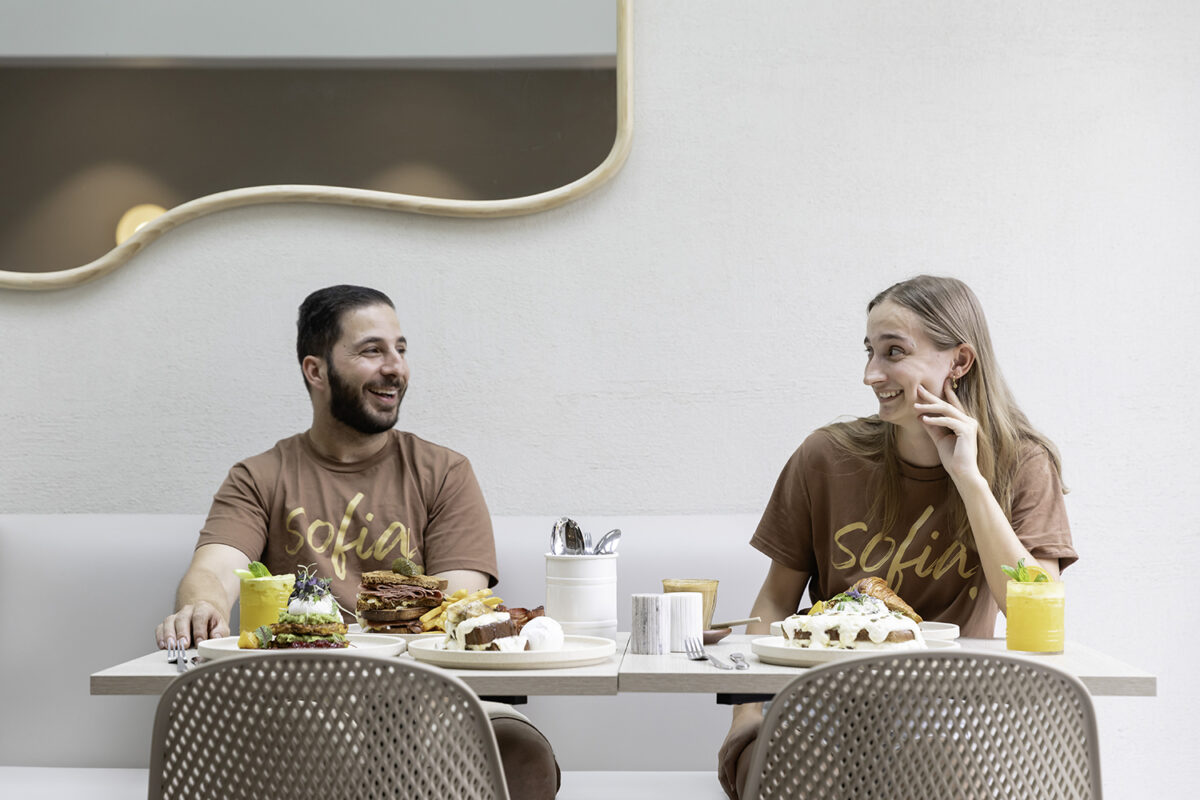Sofia fosters community with its approachable design and branding. Staff uniforms and friendly service, paired with fresh, vibrant dishes, create a cheerful and inviting dining experience.
