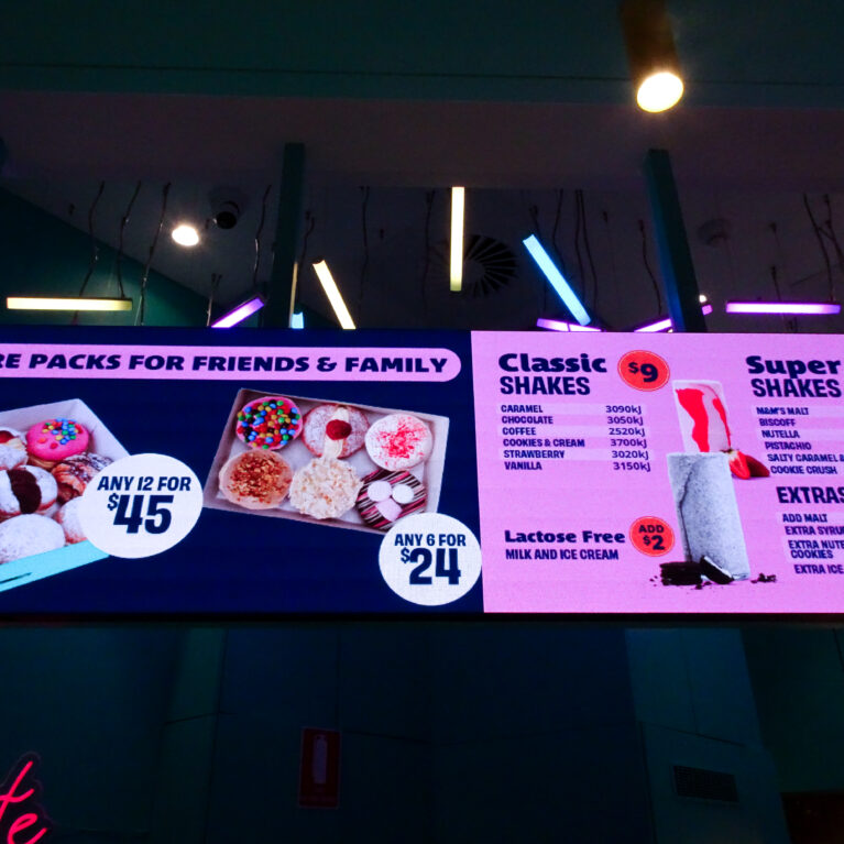 Menu design is an extension of spatial storytelling—bright, accessible, and brand-aligned.