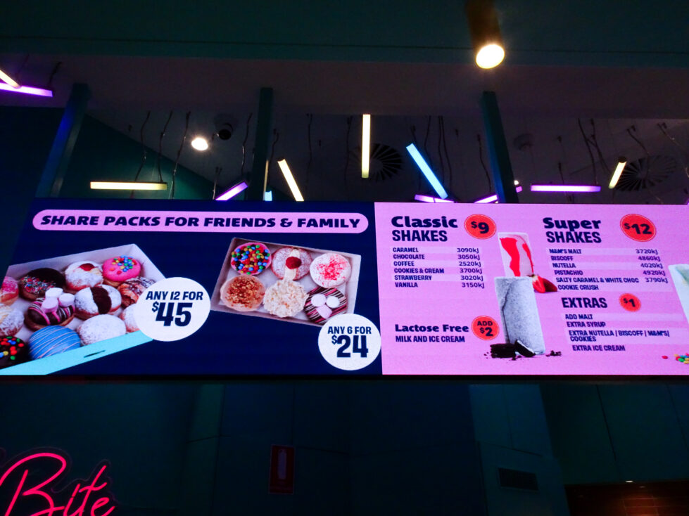 Menu design is an extension of spatial storytelling—bright, accessible, and brand-aligned.