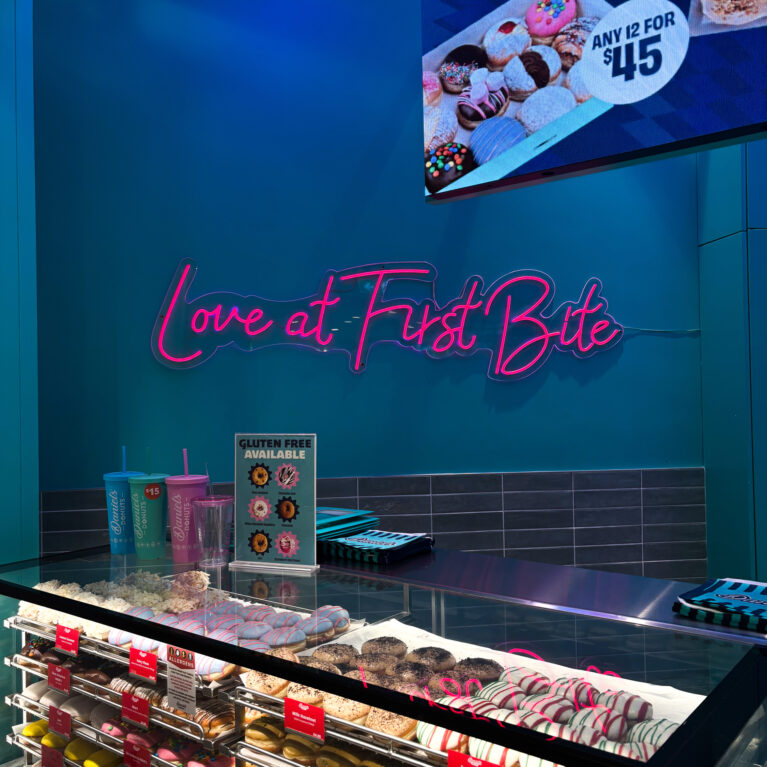 A photo-ready feature wall that says it all: Love at First Bite.