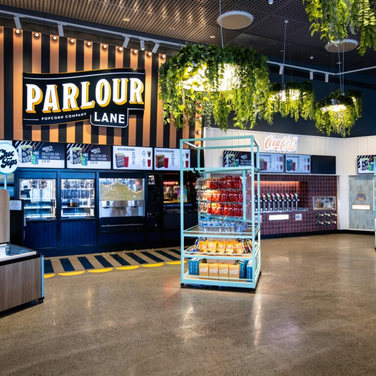 Parlour Lane at Event Cinemas is more than a concession stand—it’s a bold, immersive entry point into the movie experience. Designed with a mix of nostalgic charm and contemporary flair, this space invites guests to pause, explore, and indulge before the lights go down.