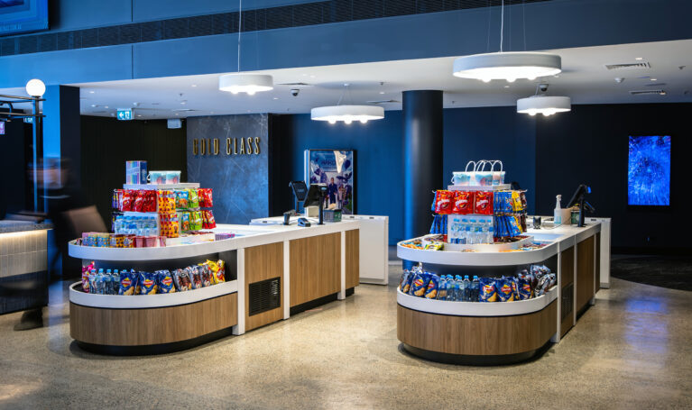 A streamlined self-serve concession zone that boosts speed, clarity and customer autonomy.