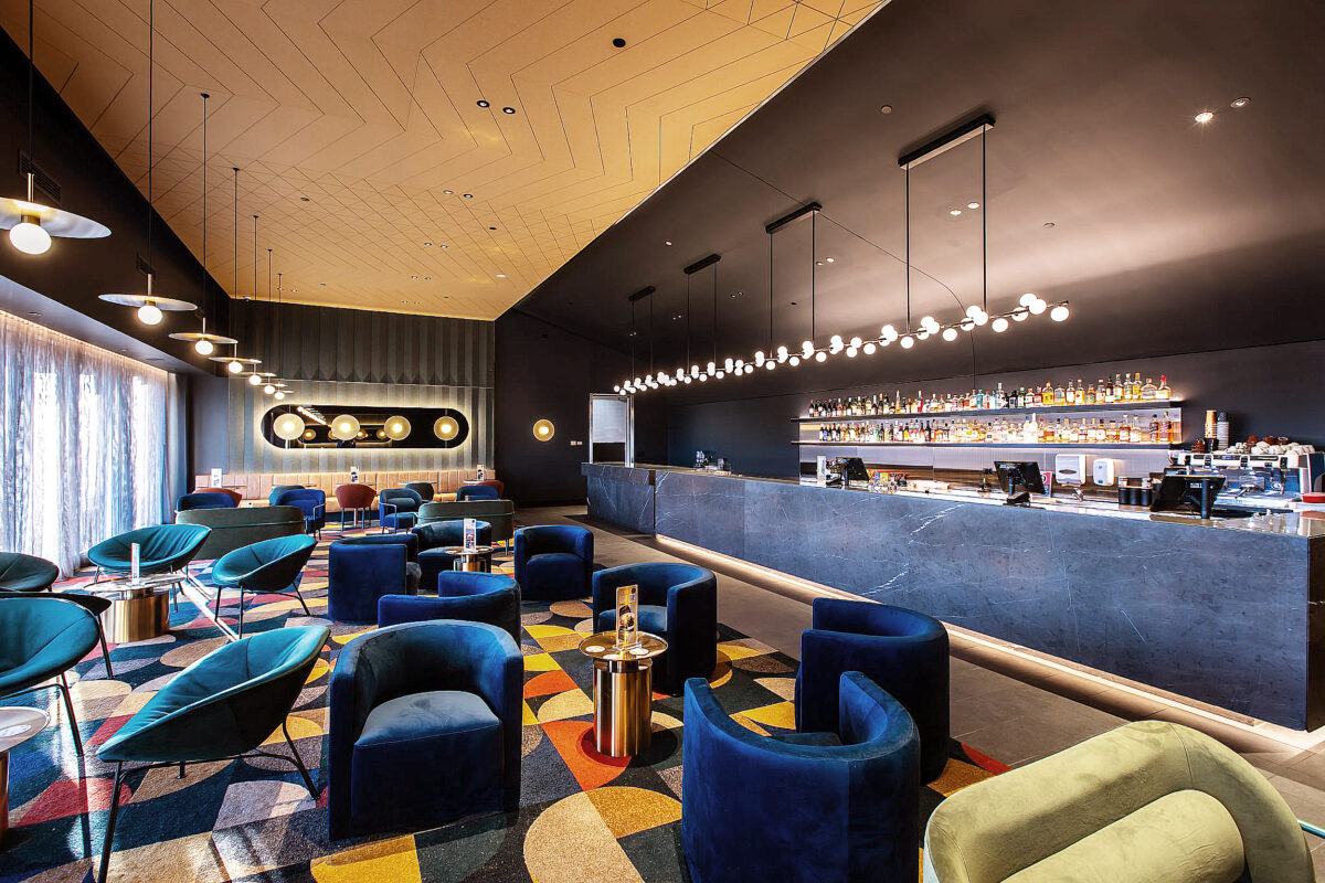 A luxurious pre-cinema retreat blending sculptural seating, atmospheric lighting and a refined hospitality sensibility.