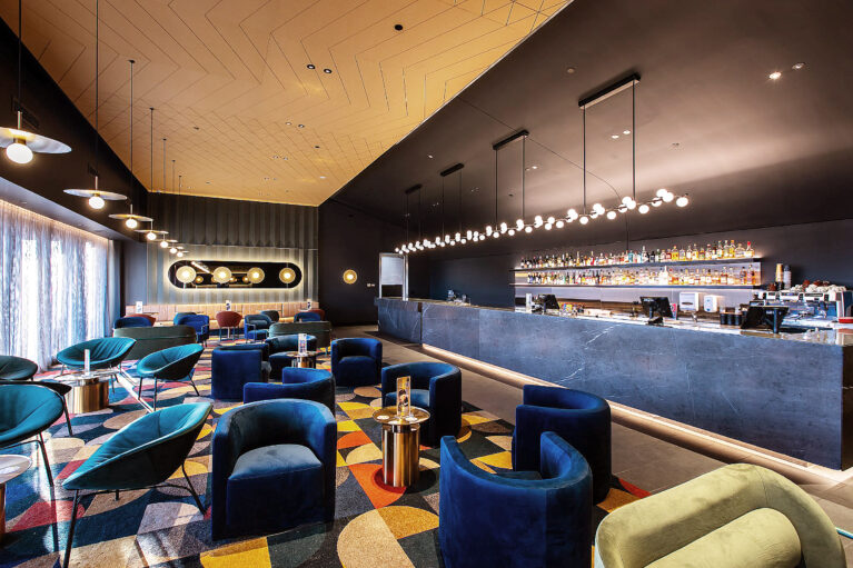 A luxurious pre-cinema retreat blending sculptural seating, atmospheric lighting and a refined hospitality sensibility.