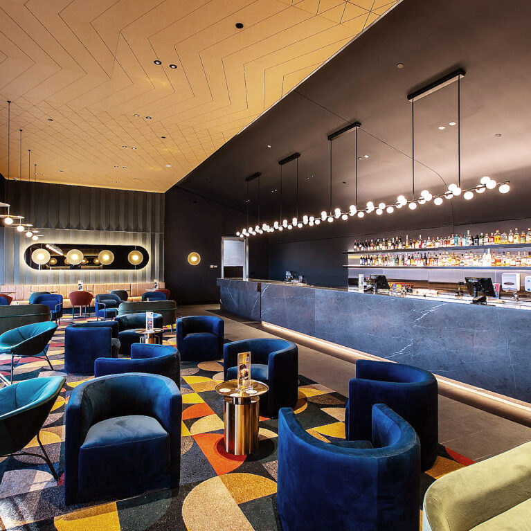 A luxurious pre-cinema retreat blending sculptural seating, atmospheric lighting and a refined hospitality sensibility.