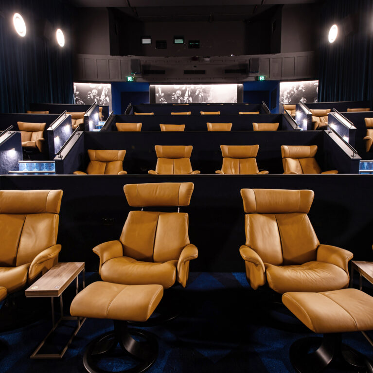 Reclined luxury and cinematic immersion brought together in a purpose-built premium theatre environment.