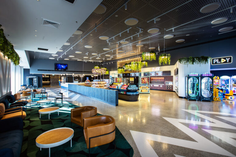 A generous, light-filled foyer that anchors the cinema experience with clarity, flow and an unmistakably upbeat energy.