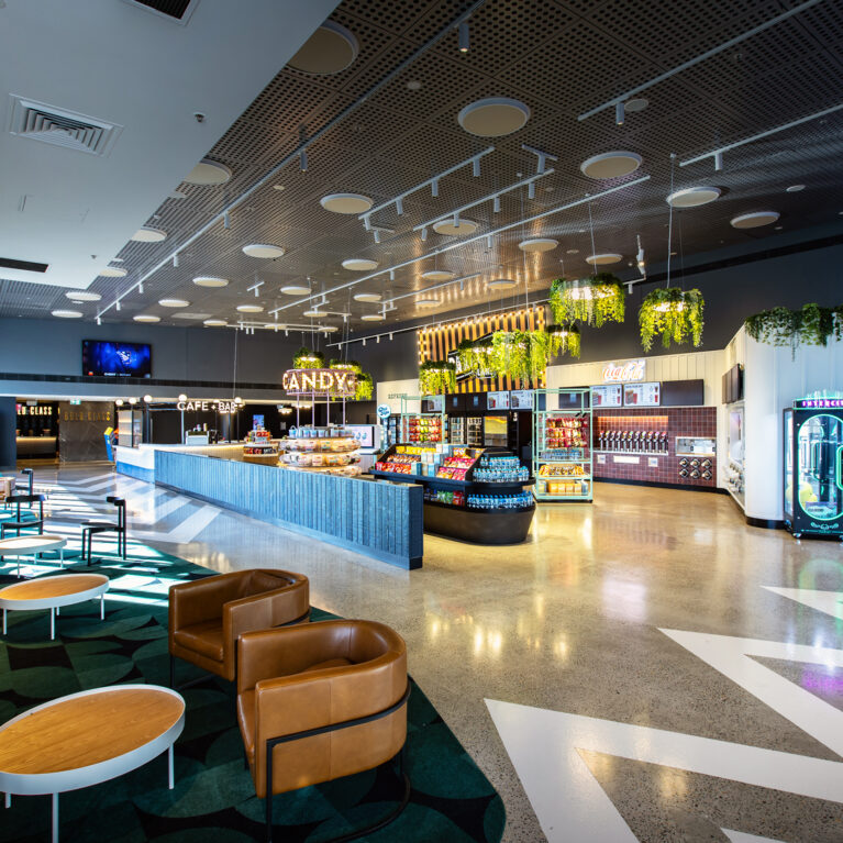 A generous, light-filled foyer that anchors the cinema experience with clarity, flow and an unmistakably upbeat energy.