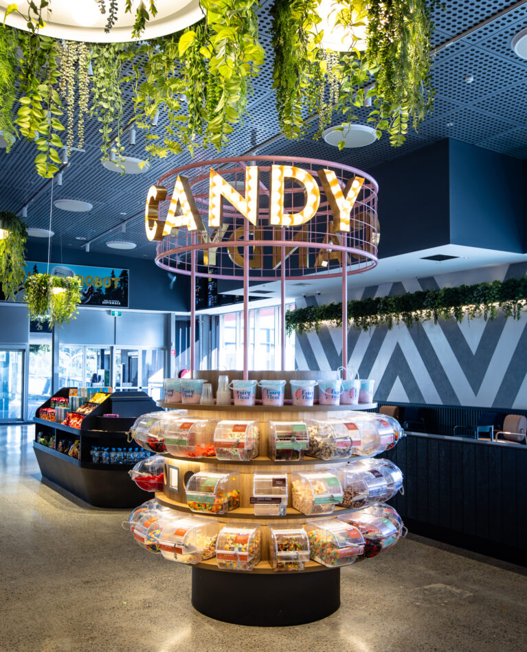 Centrepiece confectionery hub designed for high visibility and playful retail theatre.