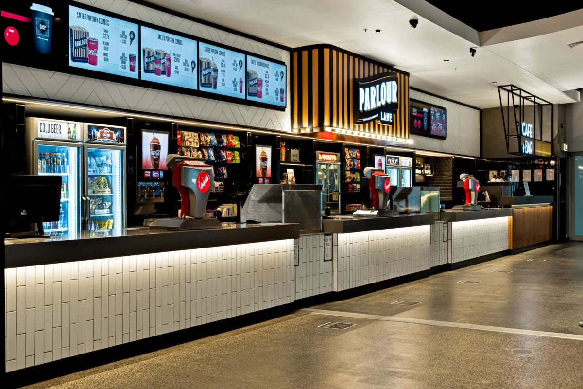 The well-organized and modern candy bar, with stylish tile backsplash and a variety of menu options.