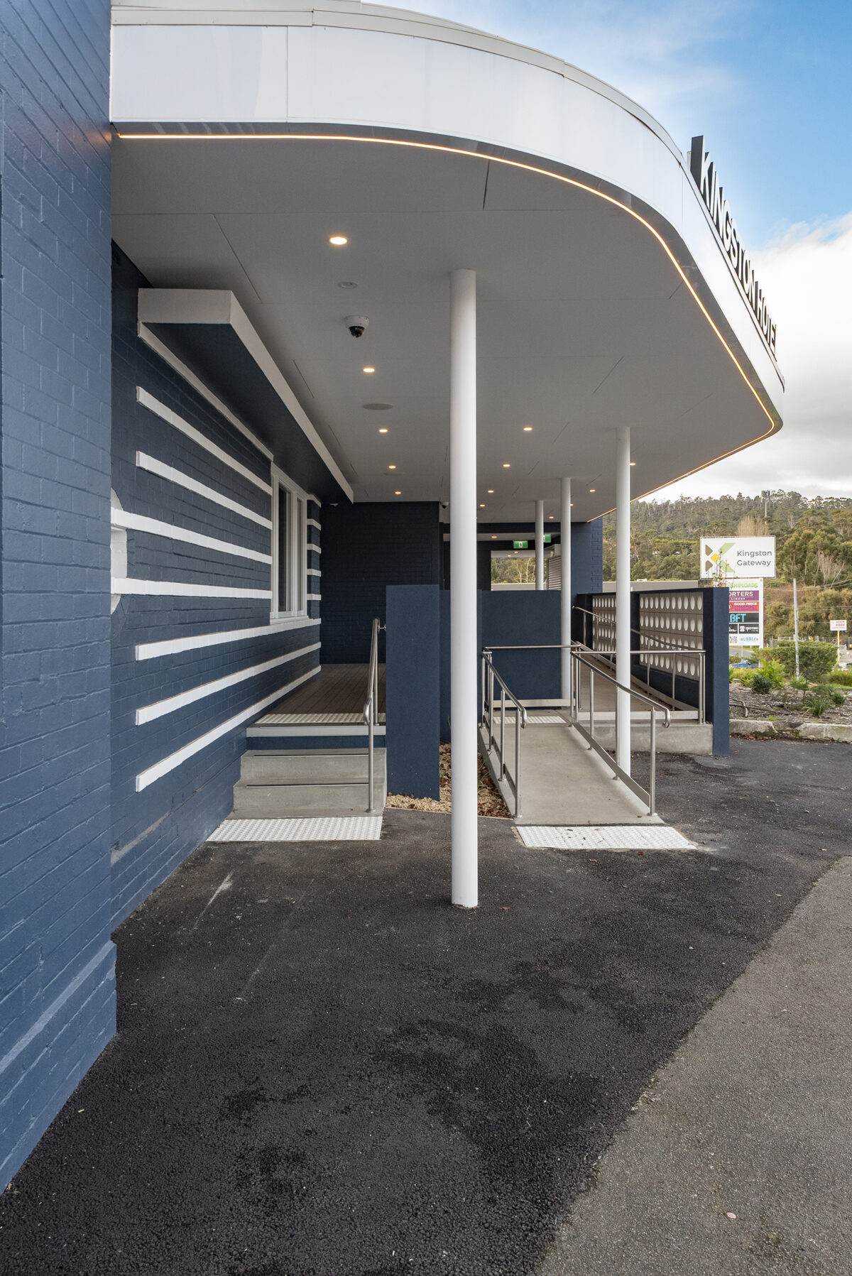 A renewed entry sequence pairs crisp geometry with improved accessibility, giving the hotel frontage a contemporary, guest-friendly identity.