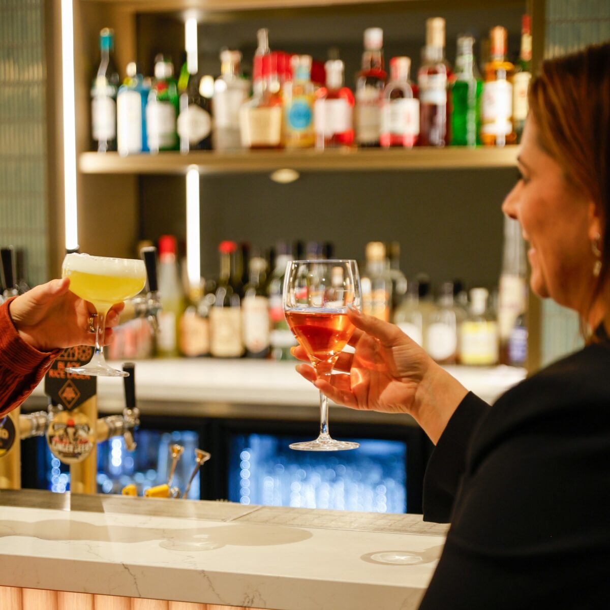 A modern bistro bar that blends bold design with laid-back charm.