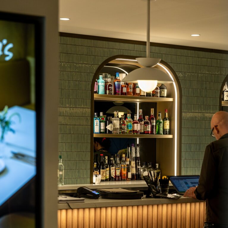 A modern bistro bar that blends bold design with laid-back charm.