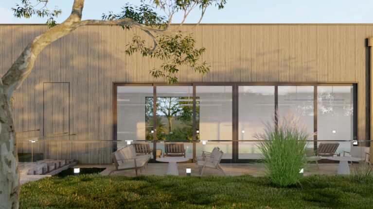 This courtyard view highlights the serene pool framed by floor-to-ceiling glass and surrounded by timber-framed outdoor seating. Lush landscaping and warm timber cladding enhance the harmony between architecture and nature, offering a relaxing and inviting environment.