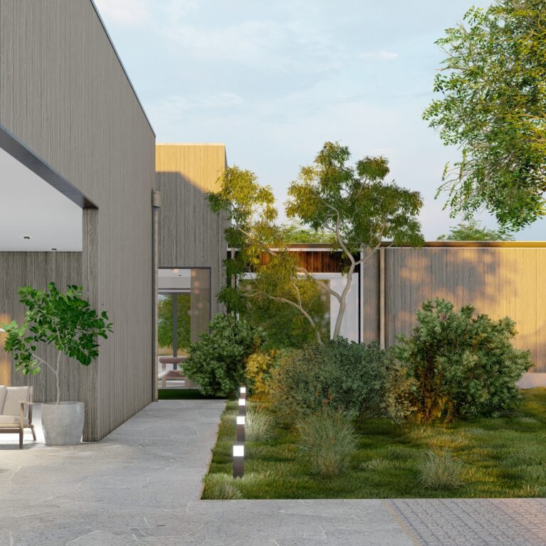 This tranquil courtyard connects the clubhouse and sanctuary, featuring lush landscaping, Torino Crazy Paving pathways, and an inviting outdoor lounge. Natural timber cladding and modern lighting enhance the connection between architecture and the surrounding coastal environment.