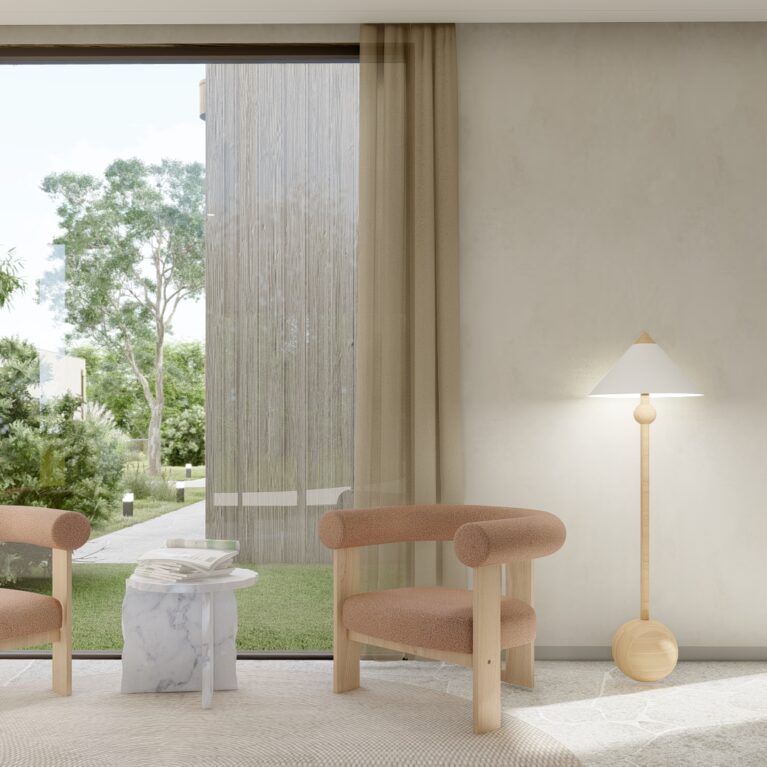 The reception's waiting area features Torino Crazy Paving flooring, soft linen drapery, and curved boucle armchairs. A sculptural marble side table and a warm timber floor lamp add a touch of elegance to the light-filled space.