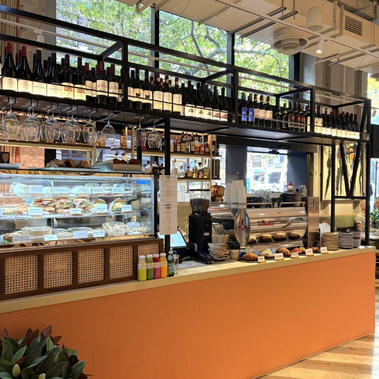 Blending urban energy with Italian conviviality, this bar area welcomes guests with vibrant terracotta tones, a curated wine display, and inviting pastries. It’s a lively focal point where locals pause for espresso, fresh bites, or an aperitivo amid the hum of the city.