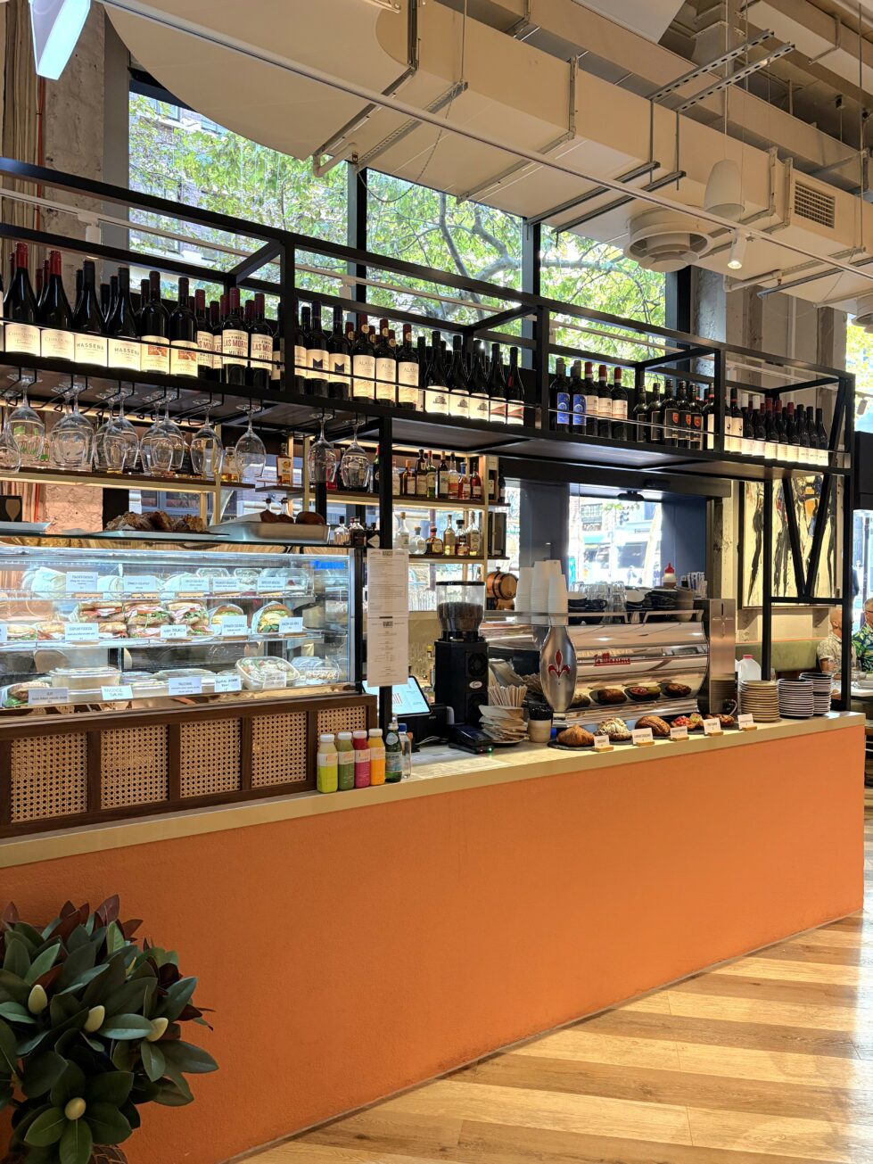 Blending urban energy with Italian conviviality, this bar area welcomes guests with vibrant terracotta tones, a curated wine display, and inviting pastries. It’s a lively focal point where locals pause for espresso, fresh bites, or an aperitivo amid the hum of the city.