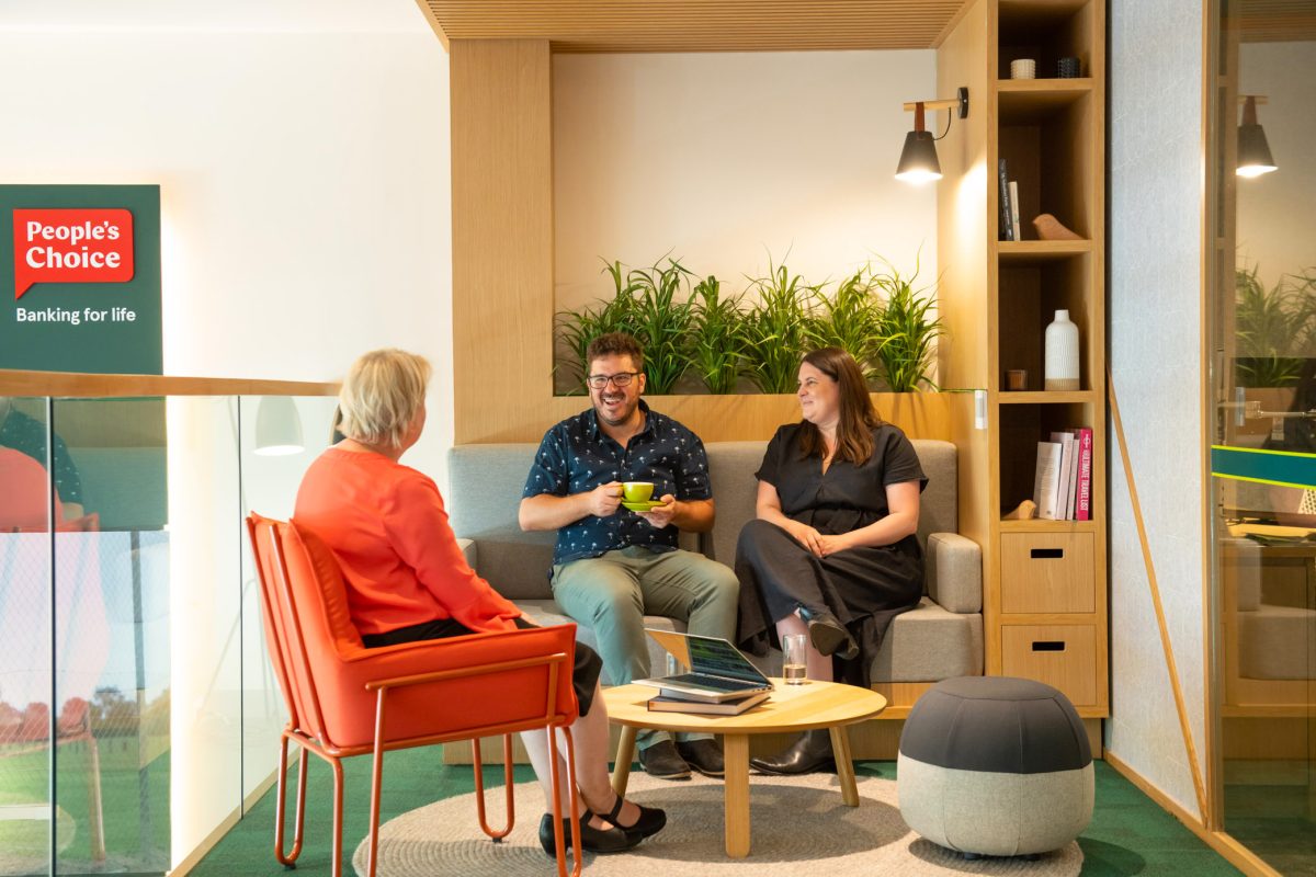 The homeloan consultation area at People’s Choice, designed to offer a relaxed, home-like setting with cozy seating and warm, natural decor.