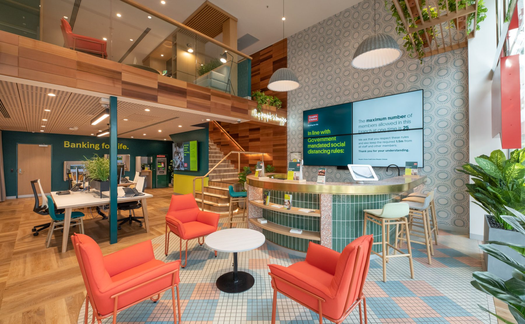 The "meetpoints" at People’s Choice bank, designed for casual interactions and collaboration, with vibrant seating and a mix of modern and natural elements.