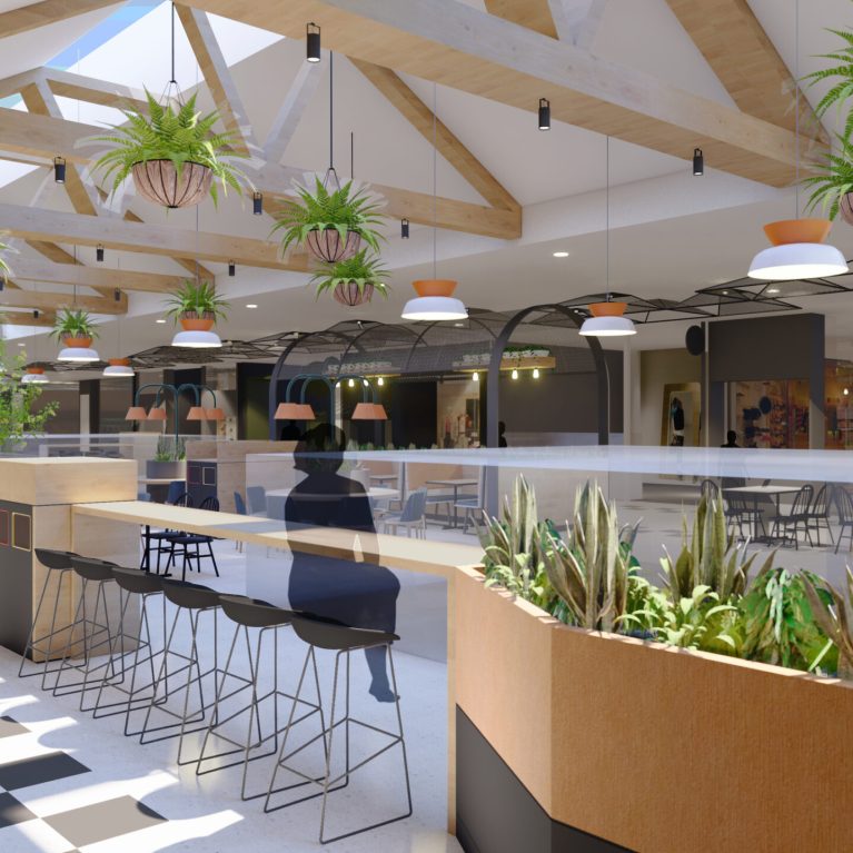 shopping mall dining area including stools, tables and custom furniture with planters