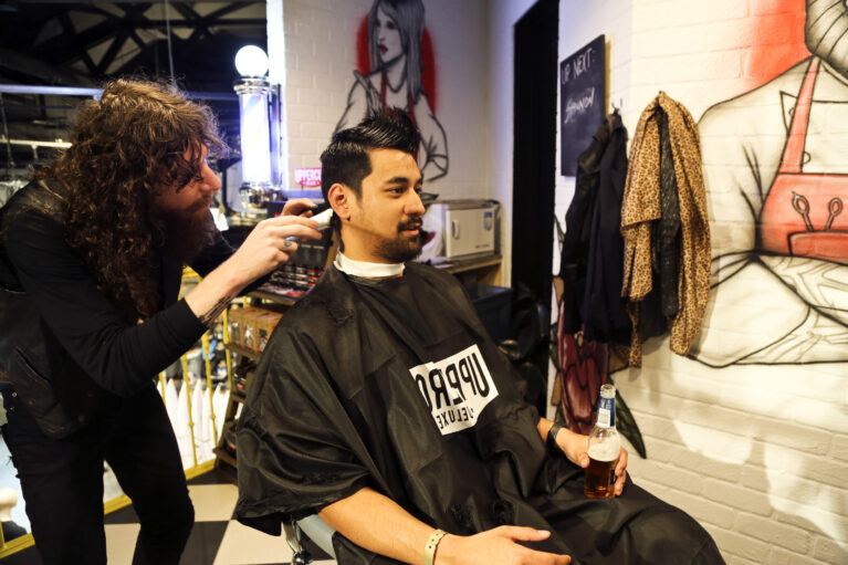 The in-store barber service adds a unique touch, offering grooming in a relaxed environment. Industrial decor, custom graffiti, and personalized service combine to create a vibrant space where customers can unwind while staying connected to the surf culture vibe.