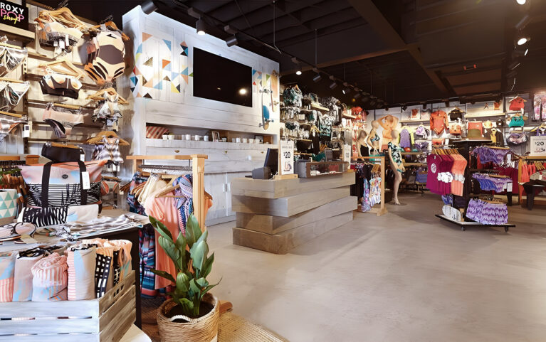 This vibrant space showcases Roxy’s iconic swimwear and lifestyle collections. The boutique blends coastal-inspired design with a relaxed retail experience, featuring colorful displays and thoughtful details that highlight the brand’s commitment to stylish, functional apparel for the active woman.