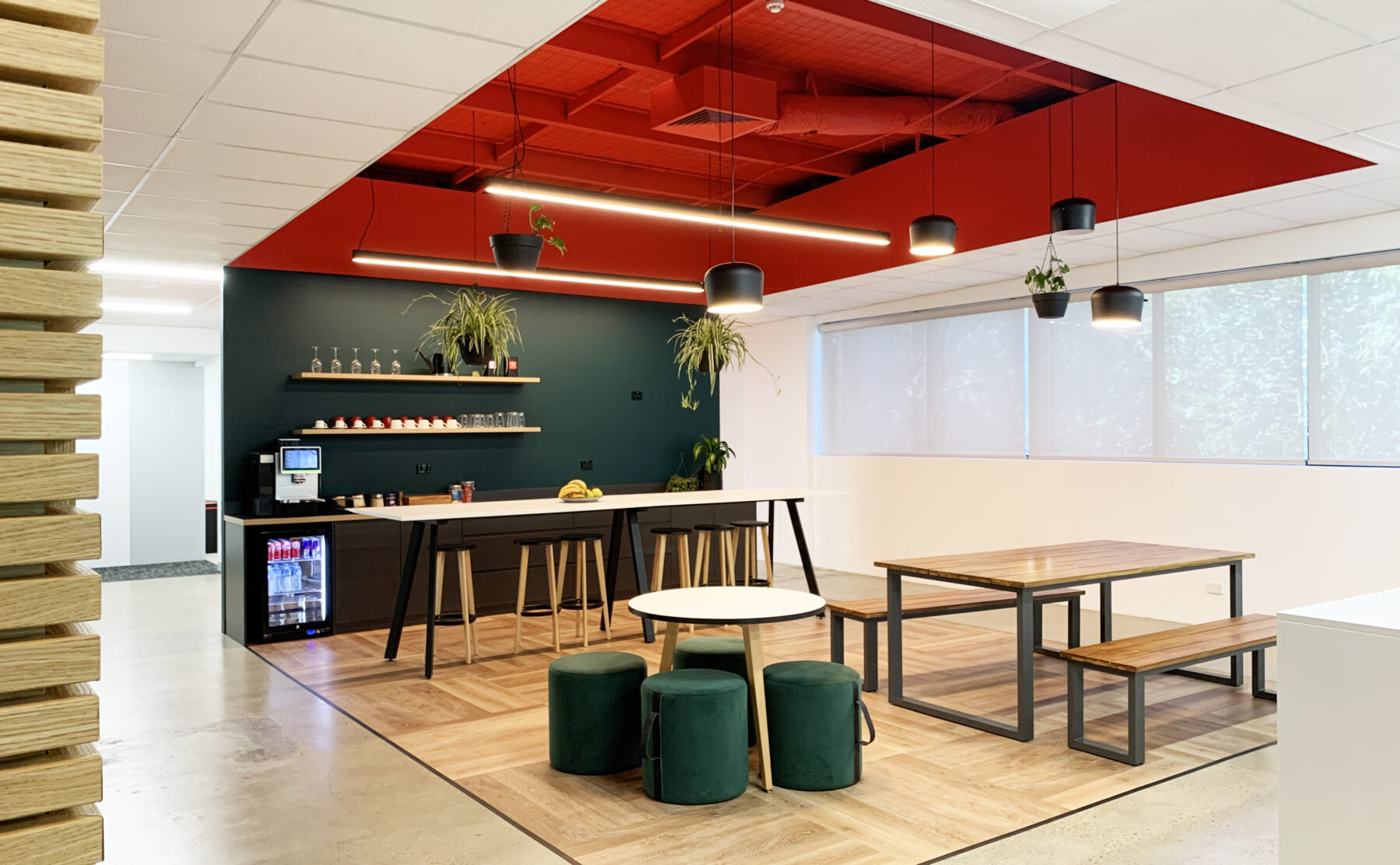Riedel's upper floor break room with modern amenities and ample seating.