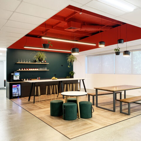 Riedel's upper floor break room with modern amenities and ample seating.