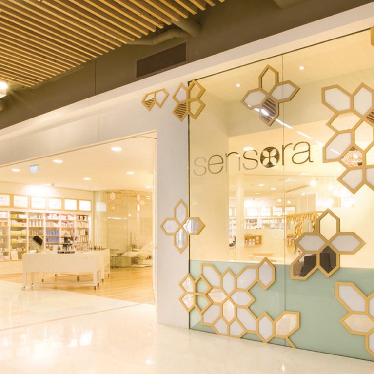 design clarity, sensora retail interior design, shopfront, full open entrance, glazing with signage, geometric pattern, nice decorative motif