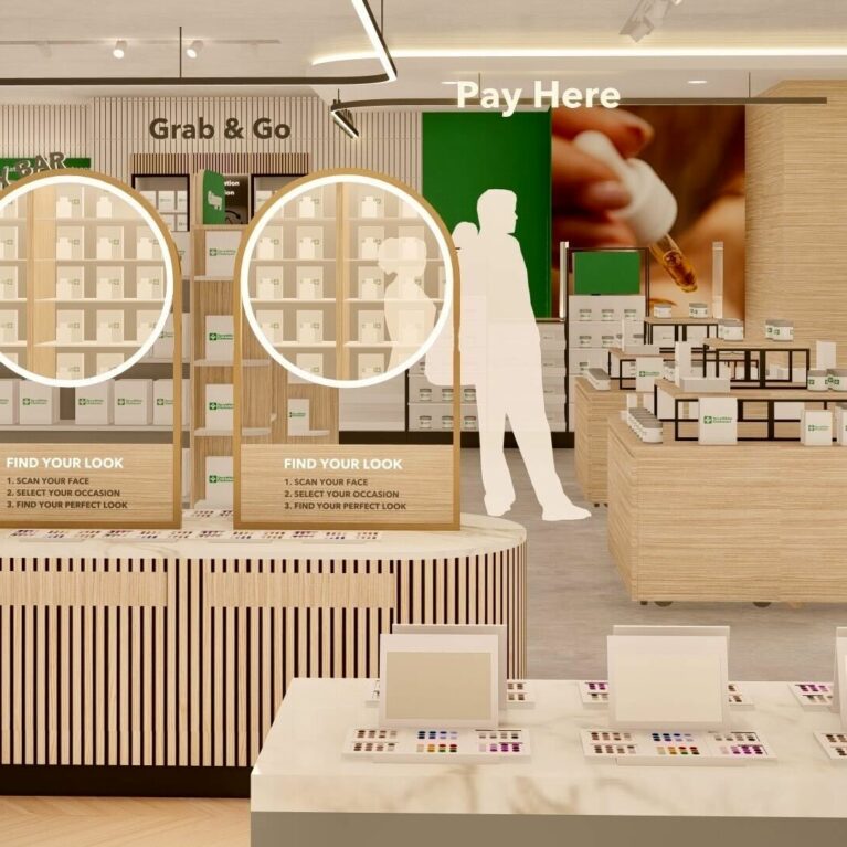 A sleek self-service beauty bar with digital face-scan stations sits opposite the Grab & Go and Vitamins area, combining technology and retail for a streamlined, personalised shopping experience.