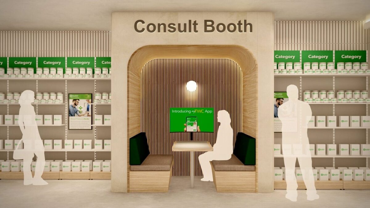 A timber-lined booth with built-in seating, soft lighting, and a digital screen, offering a semi-private space for one-to-one health or wellness discussions inside the store.