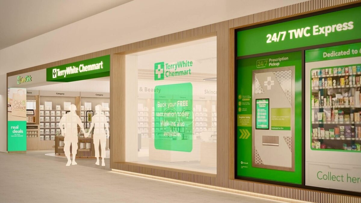 A clear exterior view of the TerryWhite Chemmart store, highlighting its glass façade, illuminated signage, and integrated 24/7 TWC Express prescription pickup kiosk for round-the-clock service.