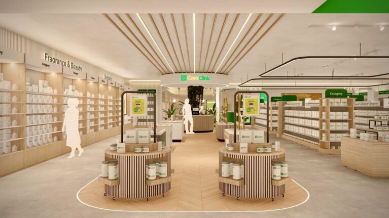 A spacious view of the store’s central hub, guiding customers towards the Care Clinic while showcasing refill stations, category signage, and a clean, natural materials palette designed for clarity and ease of navigation.