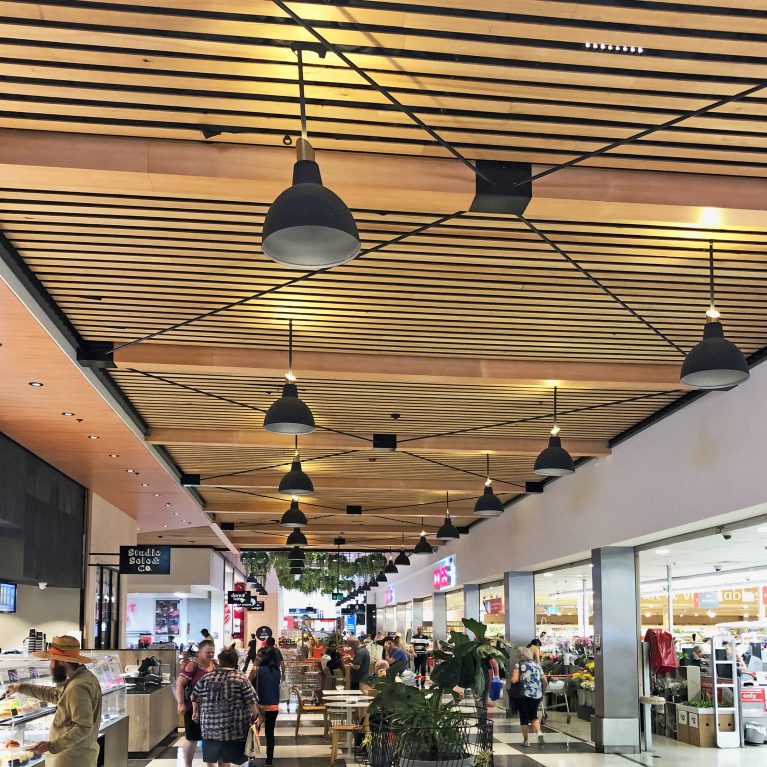 design clarity, food market, ceiling feature, timber slatting, planting, food market, checked flooring tiles, industrial design
